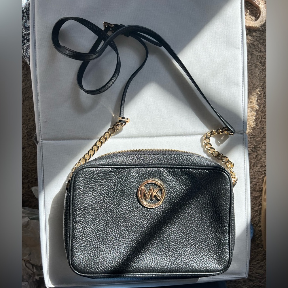 Small leather black Michael Kors crossbody.